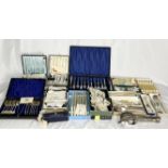 A large collection of boxed silver plated cutlery, tableware etc.