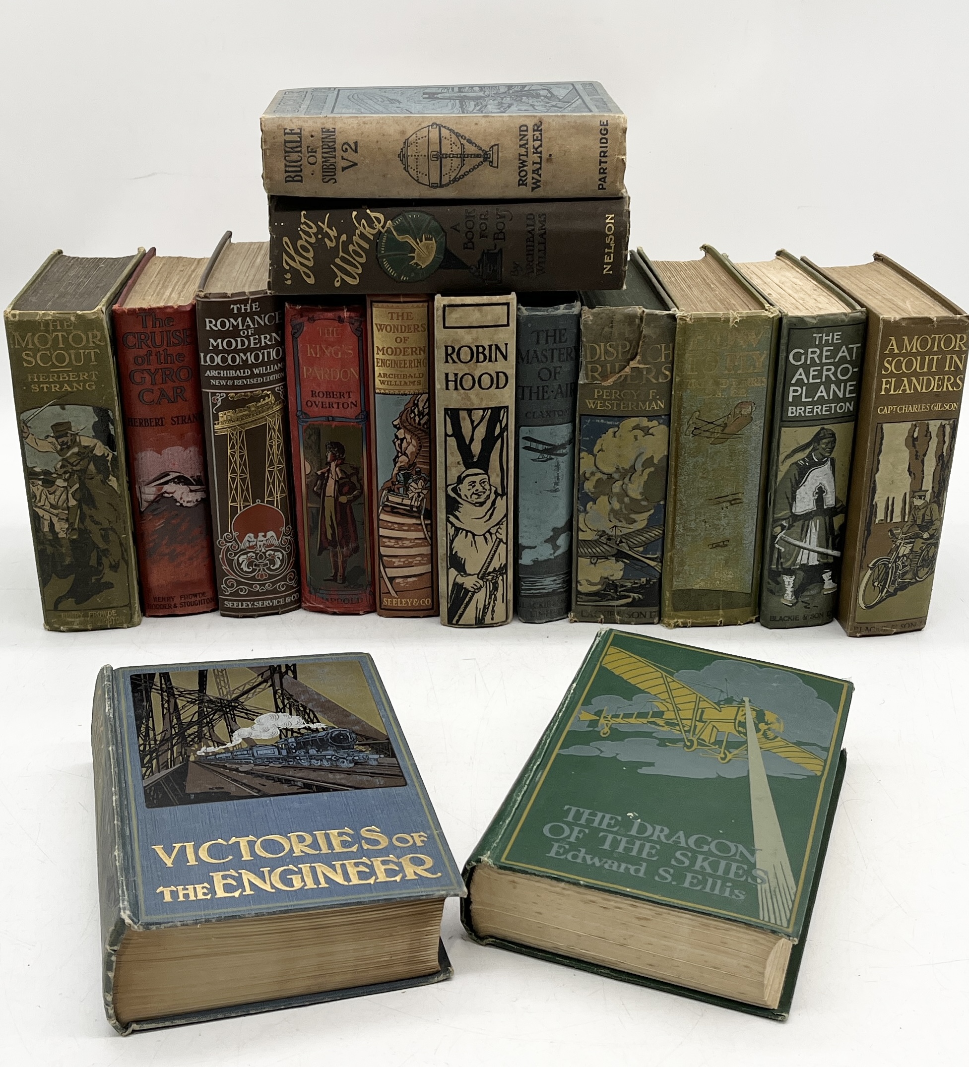 A collection of early 20th books with decorative binding many on the subject of transportation,