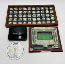 A Tottenham Hotspur Greatest Players Pins by Danbury Mint in presentation box, along with a model of