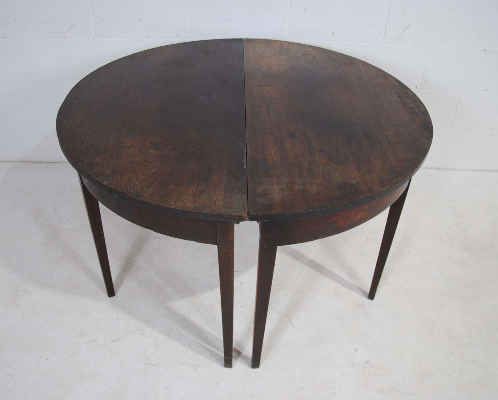 A pair of Georgian mahogany demi lune tables, raised on tapering legs - Image 2 of 8