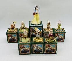 Eight boxed Royal Doulton Walt Disney Snow White and the Seven Dwarfs ceramic figurines