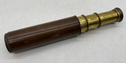 A leather bound three draw 15x telescope "Britannic" by B C & Co