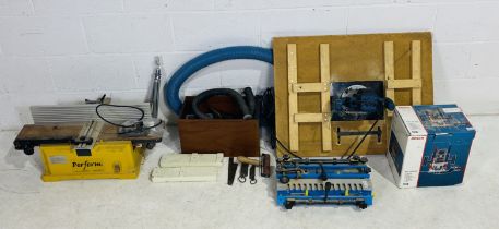 A Bosch GOF 1300 Ace Router mounted on handmade wooden base, along with a Perform Jointer Planer,