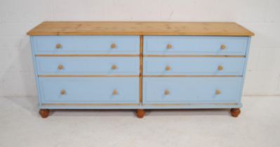 A part painted pine chest of six drawers, raised on turned feet - one loose but present - length