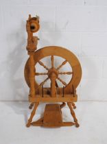 An 'Ashford' wooden spinning wheel, made in New Zealand