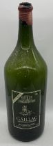 An empty oversized green glass bottle with cork and remains of wax seal, "Gaillac Cuvee Prestige