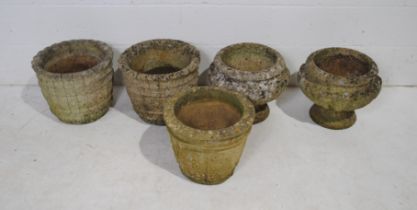 Two pairs of reconstituted stone garden pots, along with one other