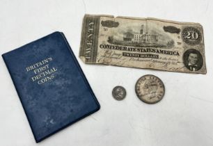 An 1864 American Civil War 20 dollar bill along with an 1837George III six pence, South Africa