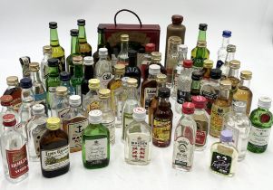 A collection of alcohol miniatures mainly comprising of rum, vodka, gin and port including Mount