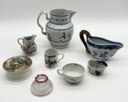 A collection of antique Oriental and other pottery including a sparrow beak jug, Prattware jug (A/F)