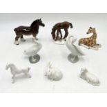 A collection of ceramics including Beswick giraffe, Royal Copenhagen rabbit and horse etc.