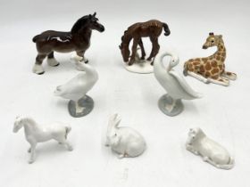 A collection of ceramics including Beswick giraffe, Royal Copenhagen rabbit and horse etc.