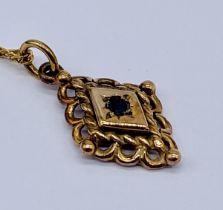 A 9ct gold pendant set with a sapphire on 9ct chain, total weight 2.2g