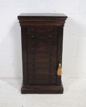A Victorian oak Wellington chest of specimen drawers - length 40cm, depth 26.5cm, height 72cm