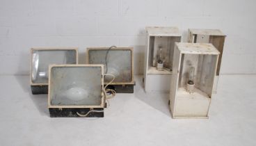 Two sets of three industrial metal lights - one set marked 'Cryselco'