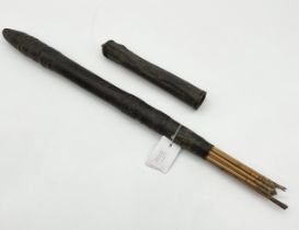 A quiver of Shiluk arrows from South Sudan in leather case