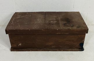 A wooden tool chest/trunk with side handles