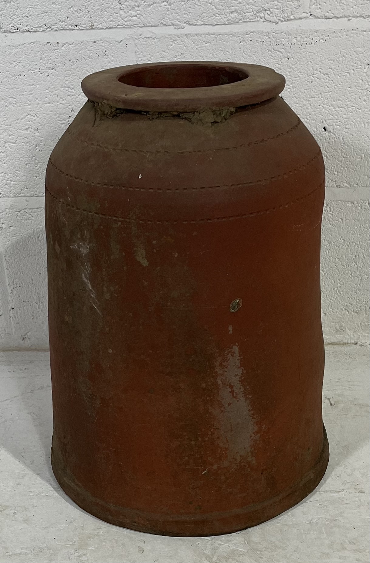 A vintage terracotta weathered rhubarb forcer