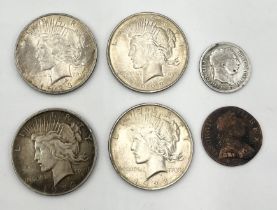Four USA peace dollars for 1922 and 1923 along with an 1817 sixpence and George III farthing