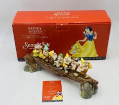 A boxed limited edition Disney Showcase Collection "Heigh-Ho" Seven Dwarfs ceramic figure group by