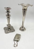 A collection of silver plated items including large trumpet vase, candlestick and cigarette case