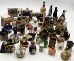 A collection of novelty and other alcohol miniatures including Der Lachs, Beswick, Pusser's Rum
