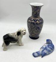 A large Chinese vase marked "Great Wall" along with a Melba Ware dog and wall sconce in the form