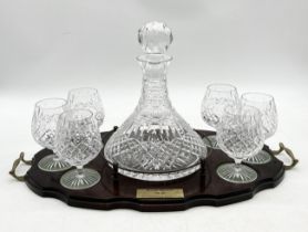 A Stuart Crystal ship's decanter and six brandy glasses on wooden presentation tray with plaque