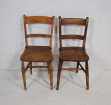 Two elm dining chairs, with bobbin turned supports