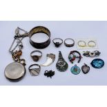 A collection of silver jewellery, fob watch, serviette ring etc.
