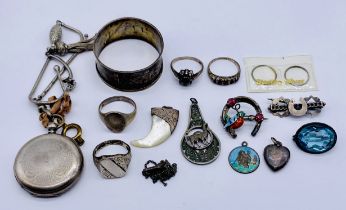 A collection of silver jewellery, fob watch, serviette ring etc.