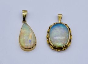 Two opal pendants both set in 9ct gold