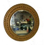 A gilt framed round mirror, diameter 60cm