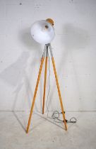 A contemporary floor lamp on tripod base - height 158cm