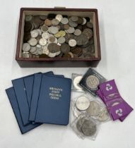 A collection of various coinage including a large number of pennies etc.