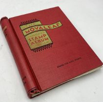 A stamp album containing a collection of 18th and 19th century stamps including a number of