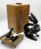 A Carl Zeiss Jena 15 x microscope, serial number 37161 in fitted case with numerous lenses and