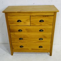 A pine chest of five drawers. 85cm x 41cm, height 89cm