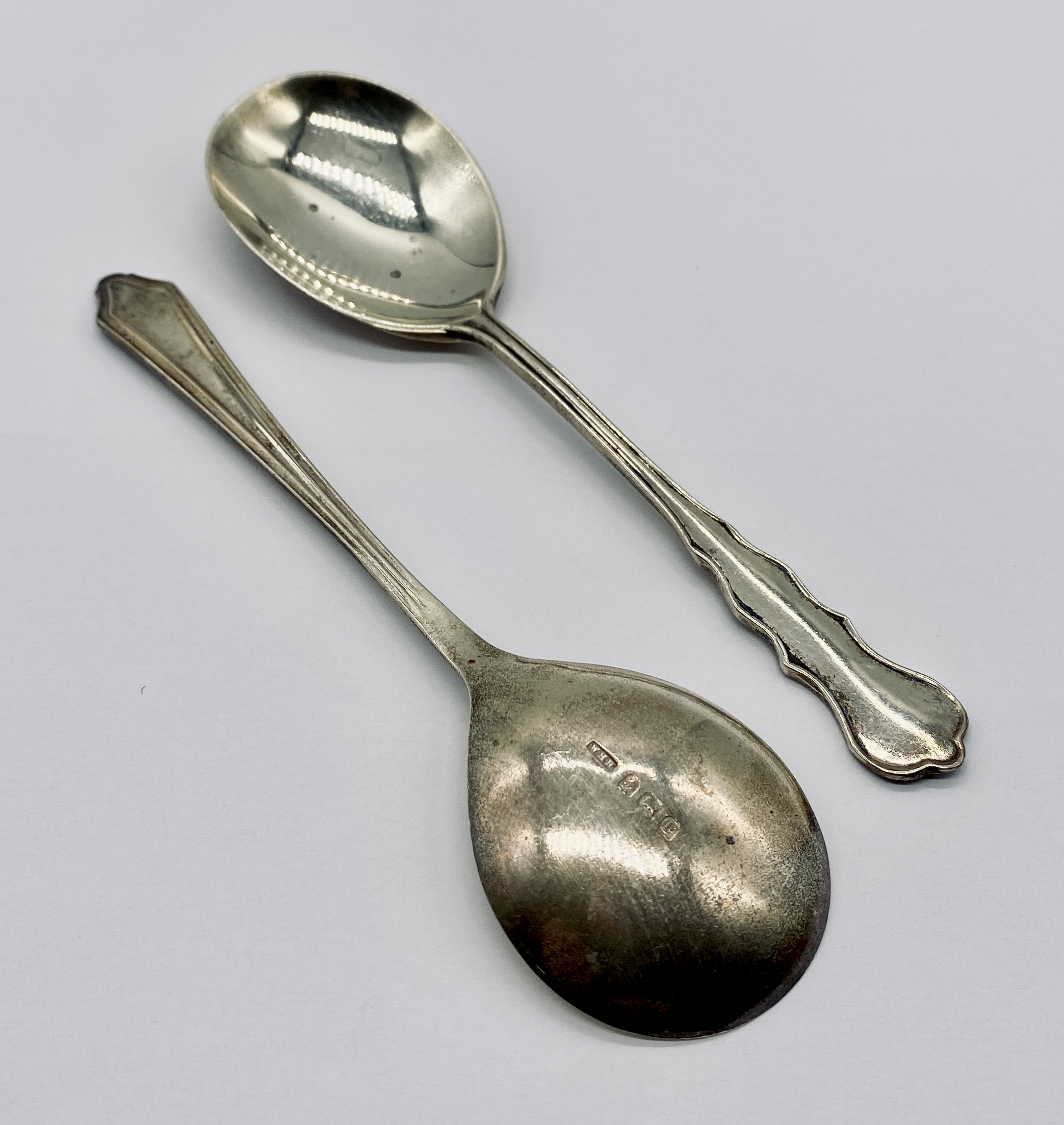 A silver weighted ashtray along with two silver spoons and a serviette ring - Image 3 of 4