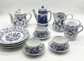 A collection of blue and white china, mainly modern Meissen onion pattern, along with a Spode Blue