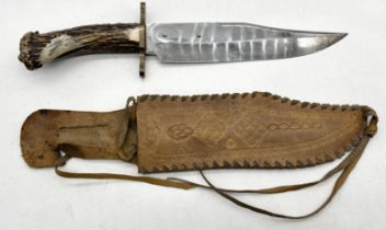 An antler handled bowie knife by R. Middleton, Sheffield, 23.5cm blade with lion pommel in suede