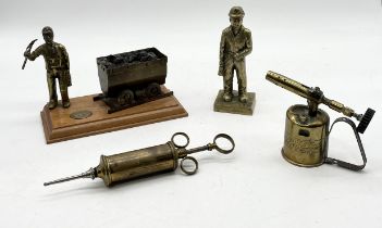 A small collection of items including brass figure of a Miner, Max Sievert brass blow torch etc.