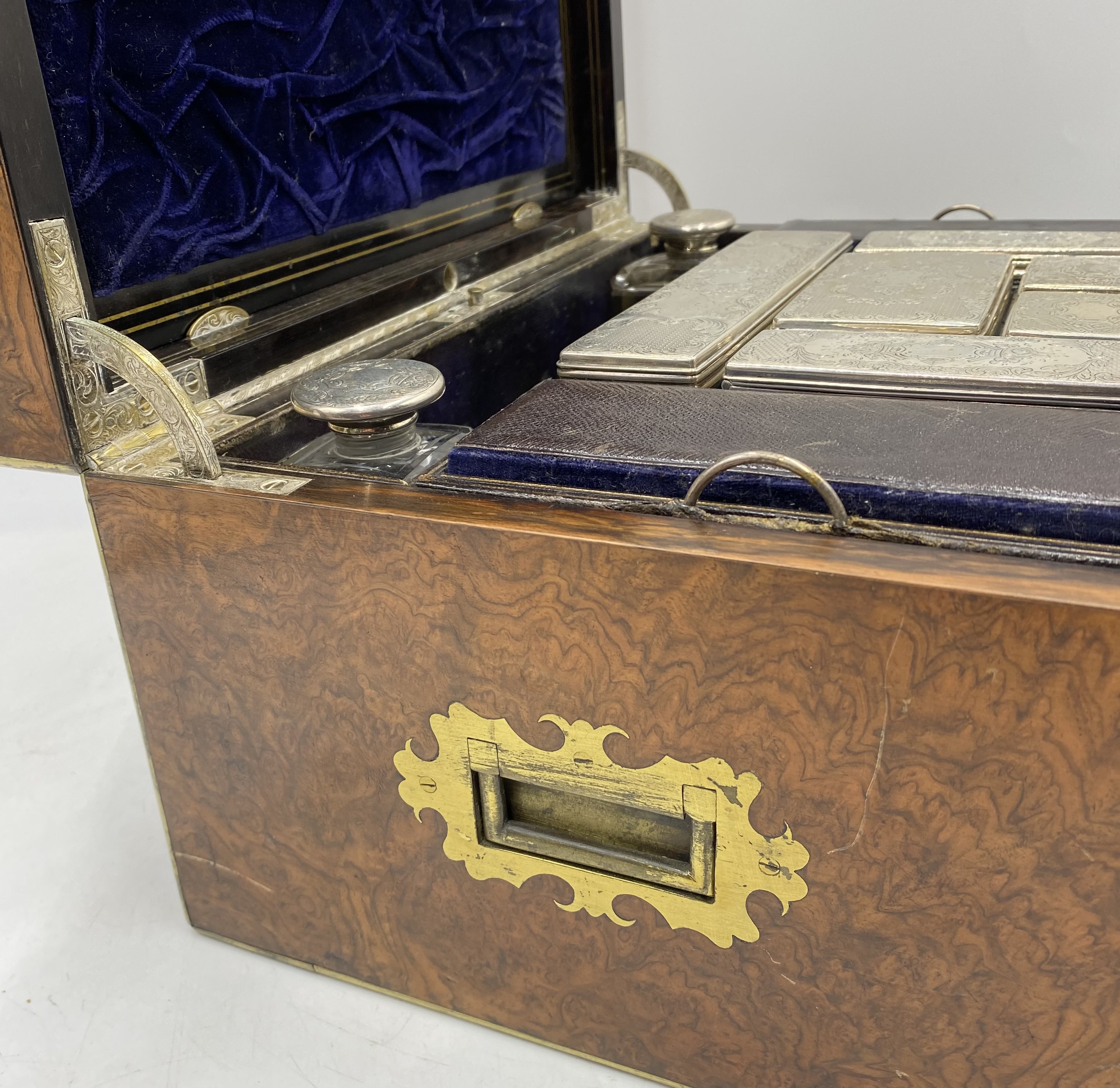 A brass bound burr walnut silver fitted dressing box with an arrangement of silver lidded bottles ( - Image 12 of 13