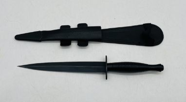 A Fairburn Sykes style commando knife in sheath