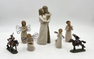 A collection of Willow Tree figures along with two Frontline Figures