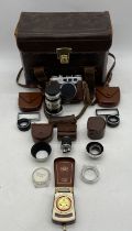 A vintage W. Voss Diax IIB camera with various lenses and other accessories