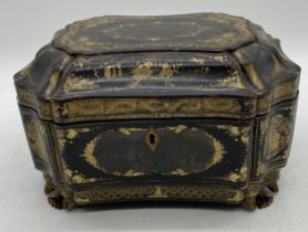 A 19th century Chinese lacquered tea caddy with pewter internal cannisters, on gilt feet