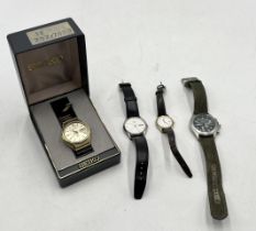 A vintage Seiko Chronograph 200m with green dial along with three other Seiko wristwatches