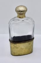 A Victorian cut glass hip flask with silver gilt stopper