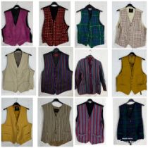 A collection of twelve vintage waistcoats including hunting examples